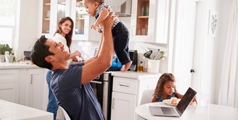 Hispanic family in home